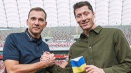 Robert Lewandowski received a captain's armband from Andriy Shevchenko