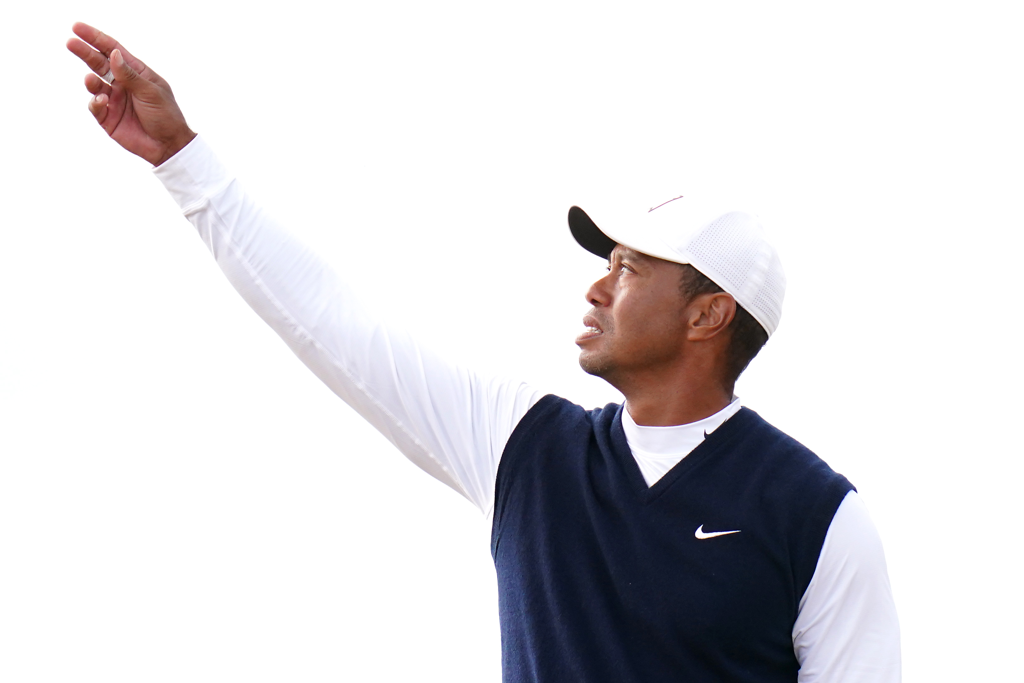 Tiger Woods checks the wind on the 14th hole during day one of The Open at St Andrews