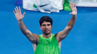 Alcaraz overcomes second-set wobble to progress in Doha