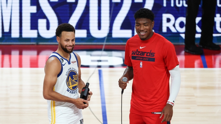 Stephen Curry (L) and Rui Hachimura (R) address the fans in Japan ahead of the Warriors' pre-season game against the Wizards