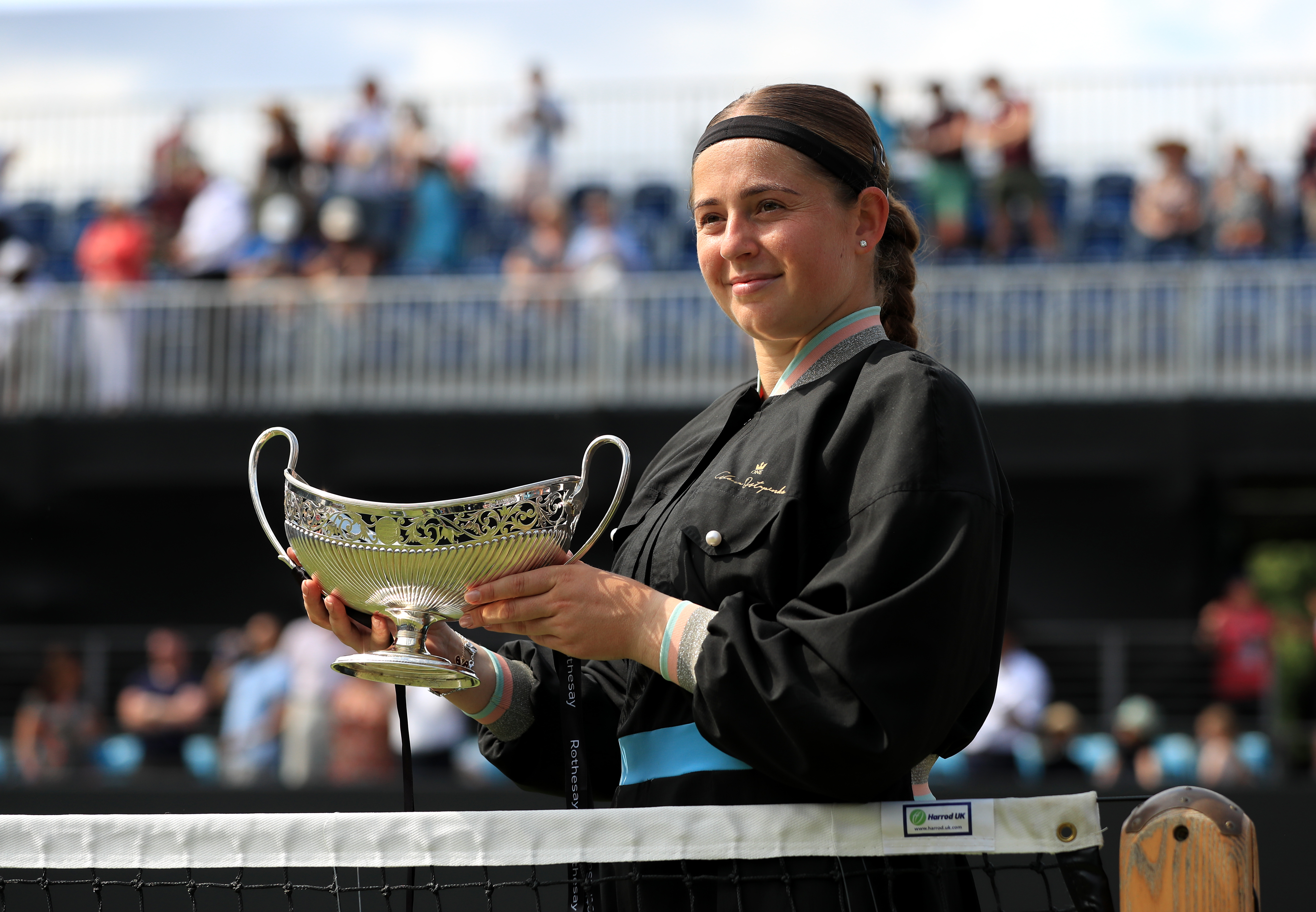 Birmingham champion Jelena Ostapenko progressed to a last-16 meeting with Harriet Dart