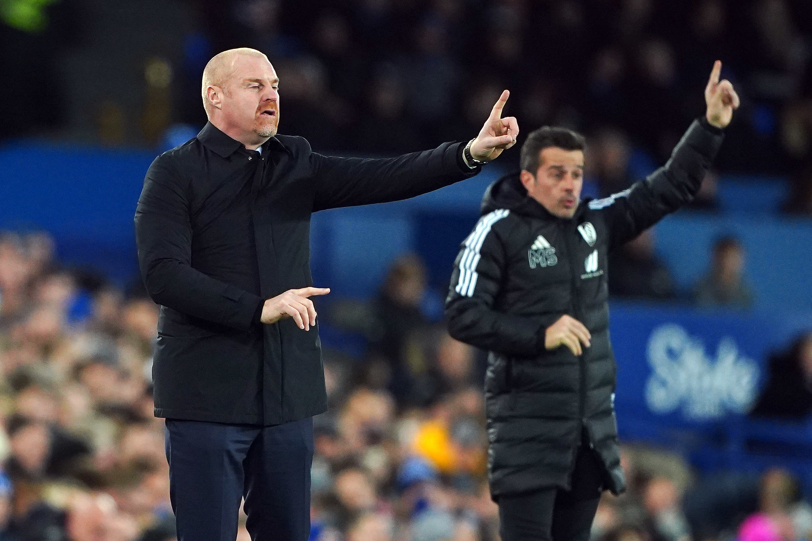 Everton manager Sean Dyche, left, and Fulham boss Marco Silva