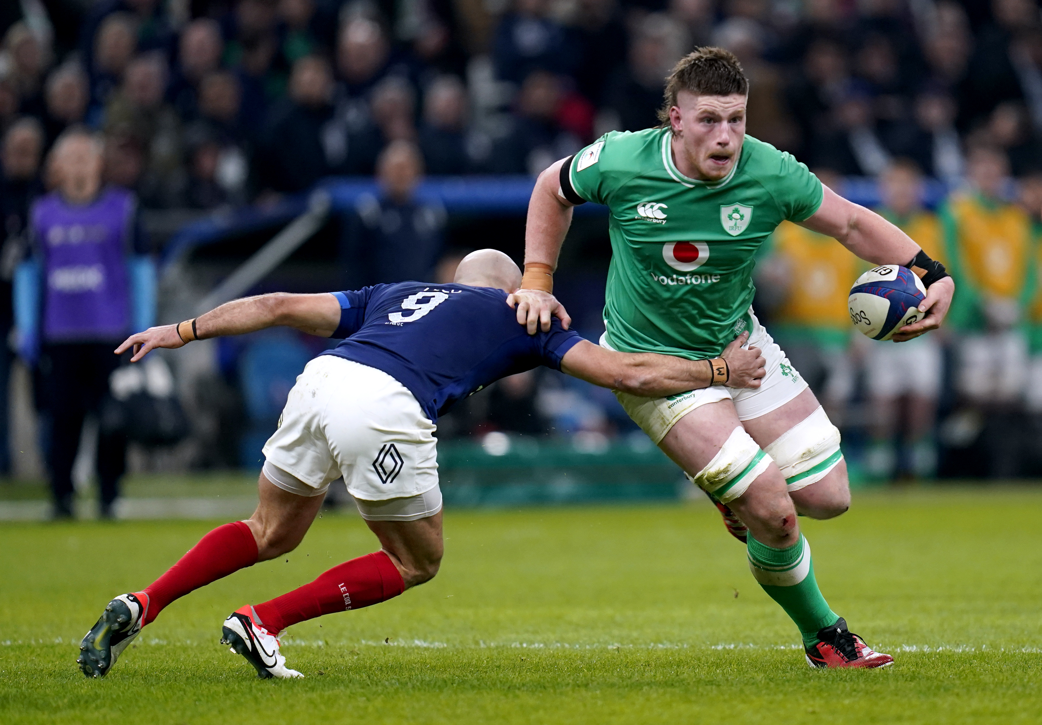 Ireland's Joe McCarthy dodges a tackle