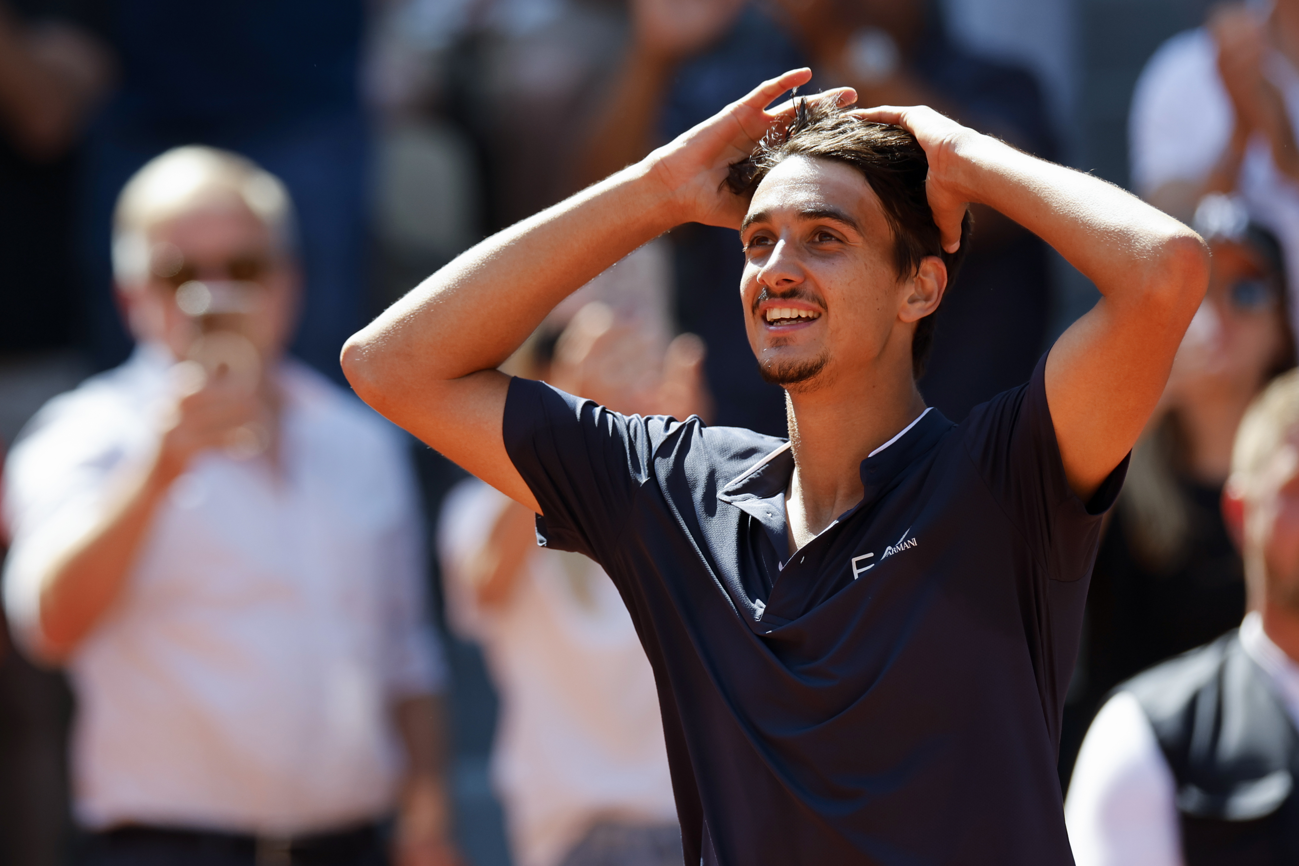 Lorenzo Sonego looks disbelieving after beating Andrey Rublev