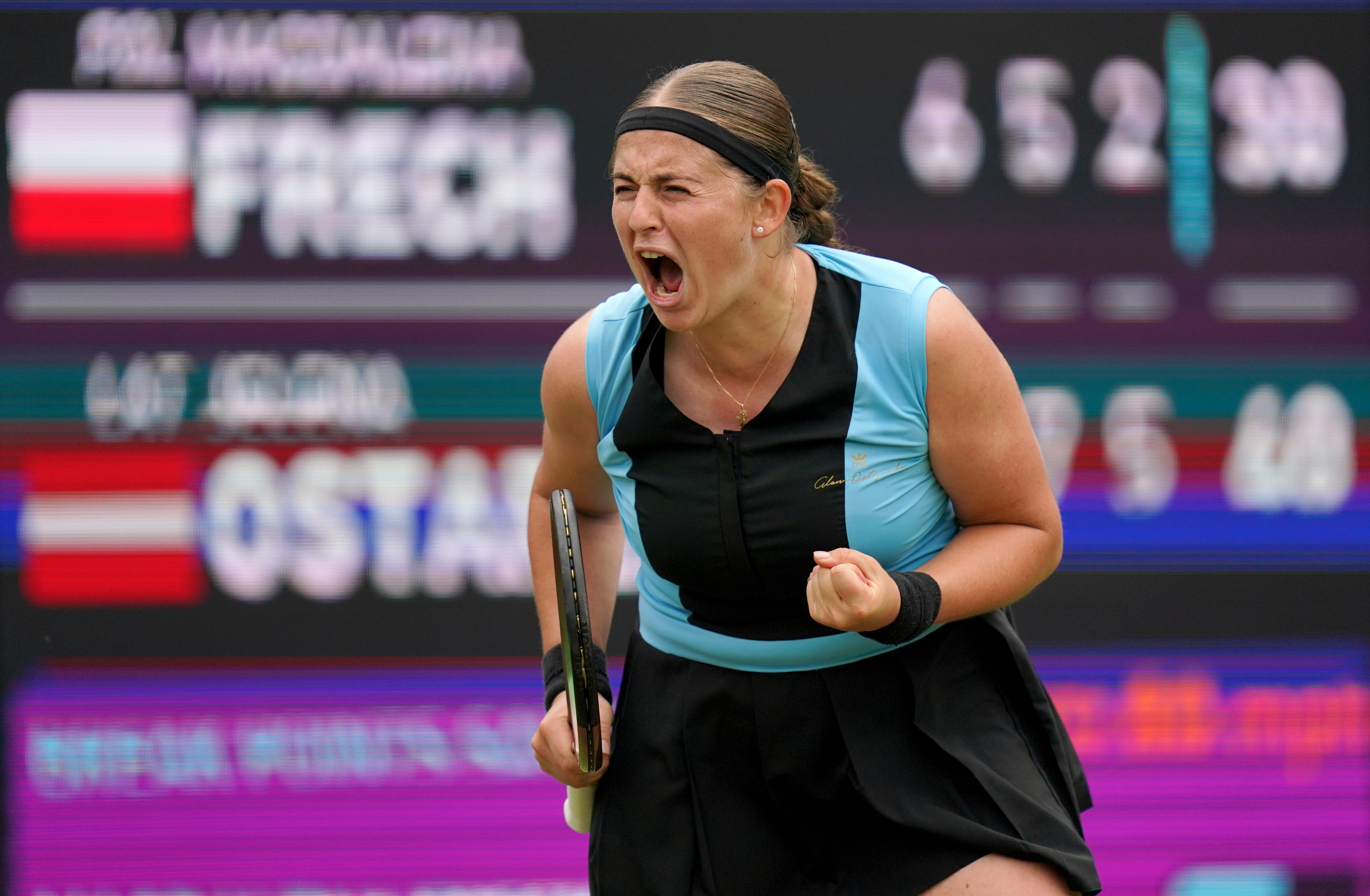 Jelena Ostapenko celebrates her comeback victory over Magdalena Frech