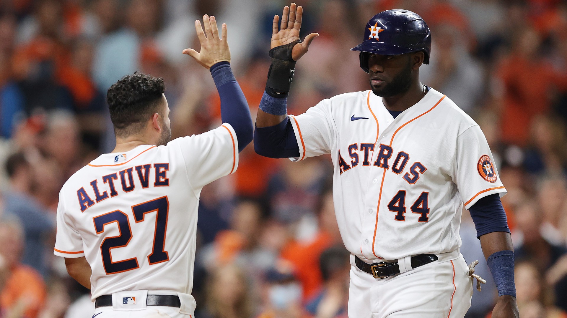 Houston Astros star Yordan Alvarez (R) celebrates with team-mate Jose Altuve