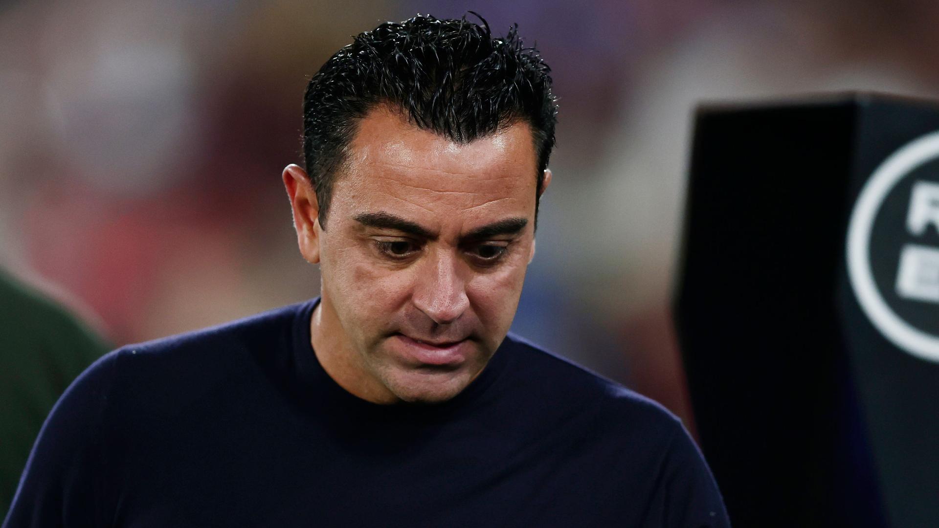 Xavi was sent off for Barcelona (Alvaro Medranda/AP)