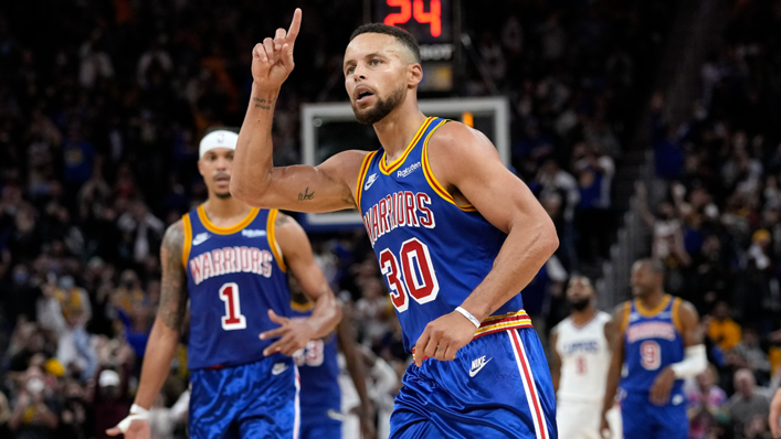 Stephen Curry #30 of the Golden State Warriors celebrates after he made a three-point basket against the LA Clippers late in the fourth quarter
