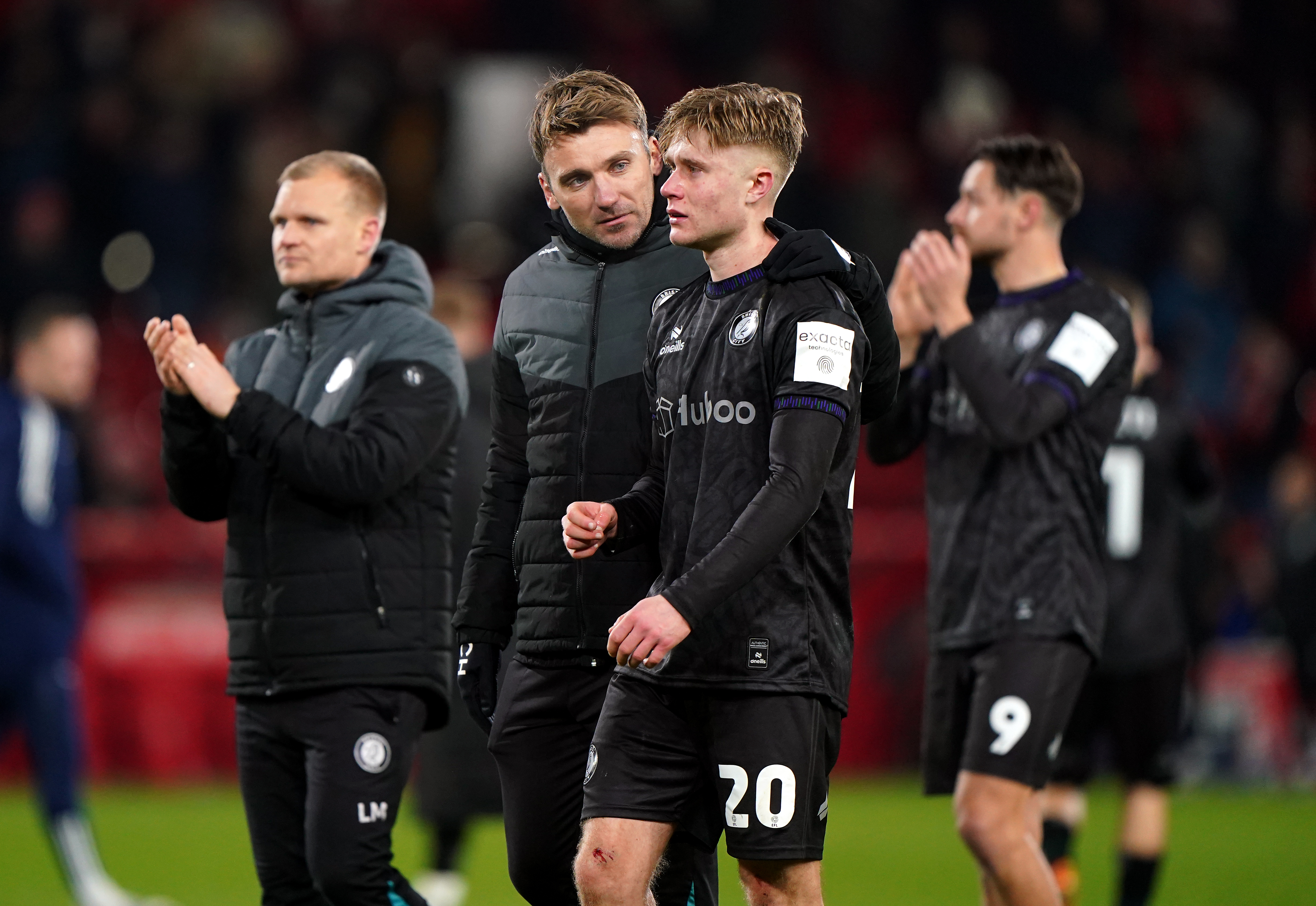 Sam Bell is consoled after seeing his penalty saved