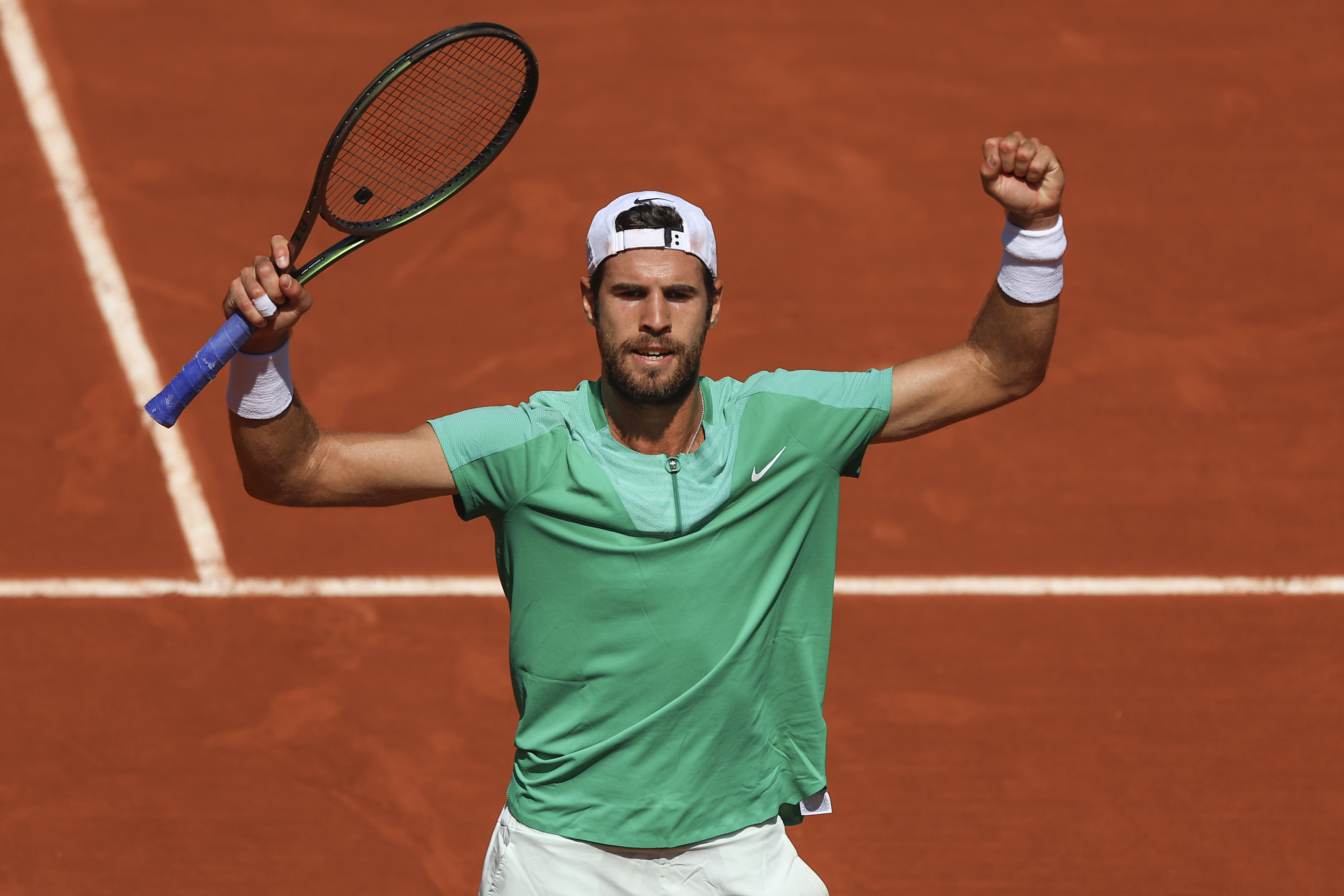 Karen Khachanov celebrates his French Open comeback