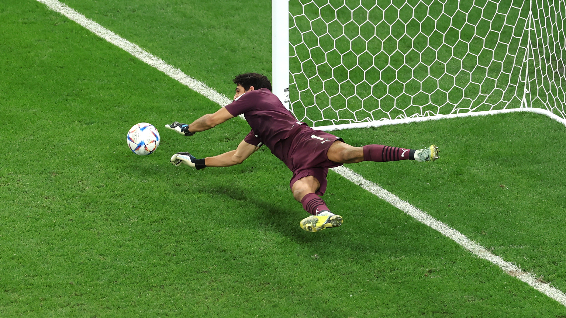Yassine Bounou saves Sergio Busquets' spot-kick