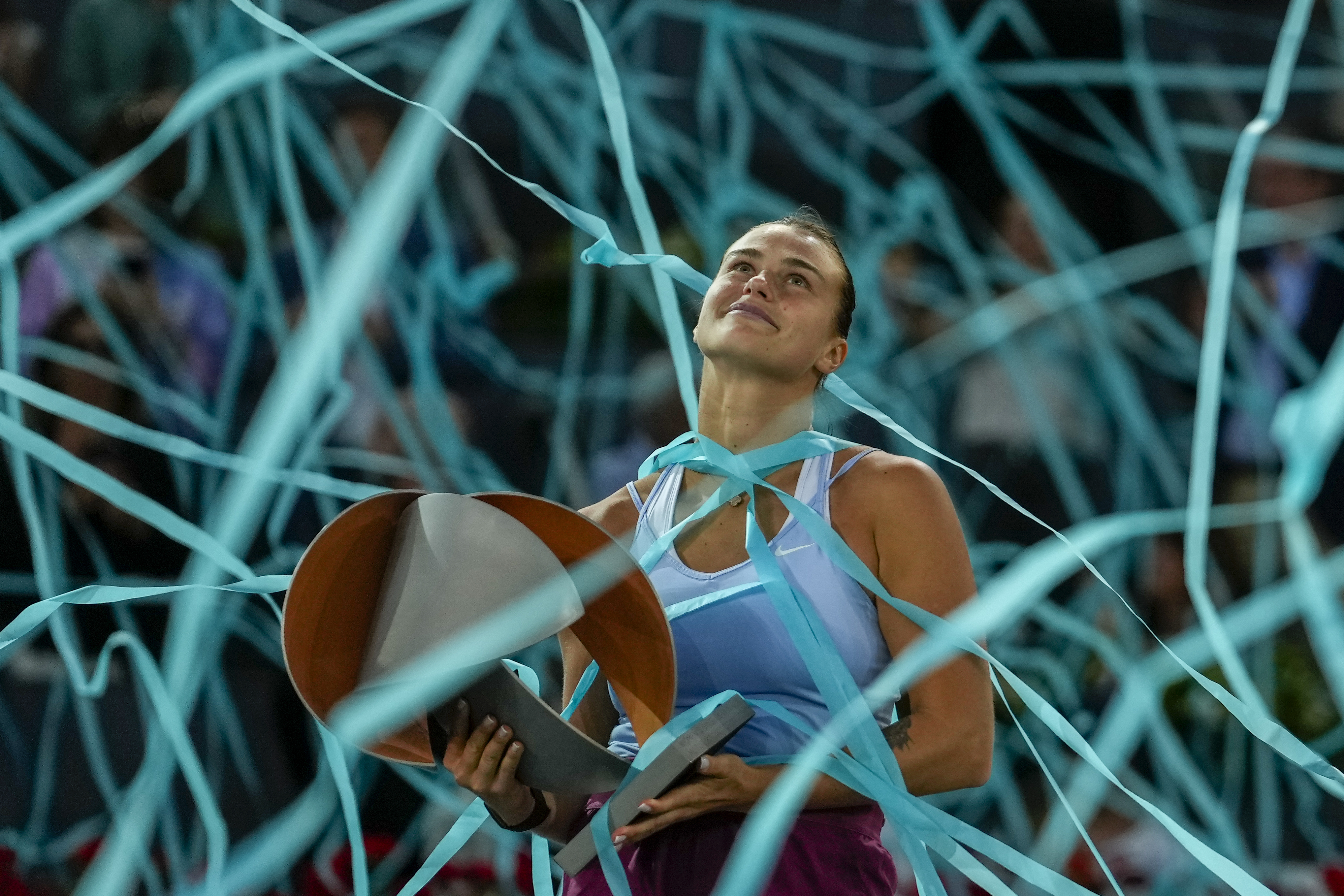 Aryna Sabalenka holds the Madrid Open trophy