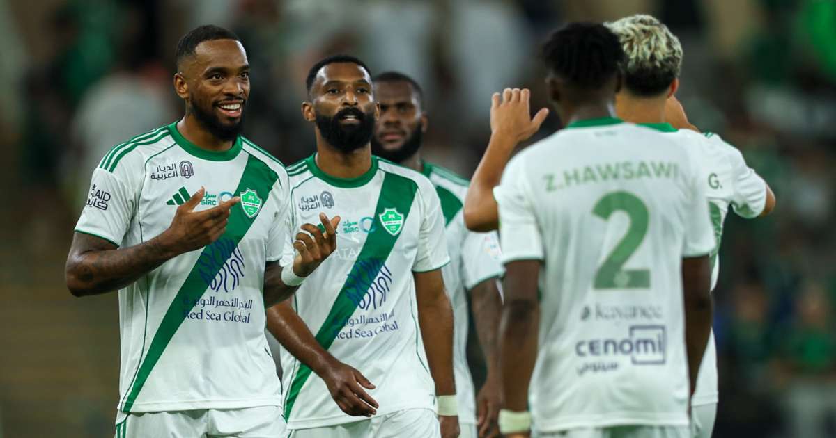 Al-Ahli players celebrating in the Saudi Pro League match against Al-Riyadh