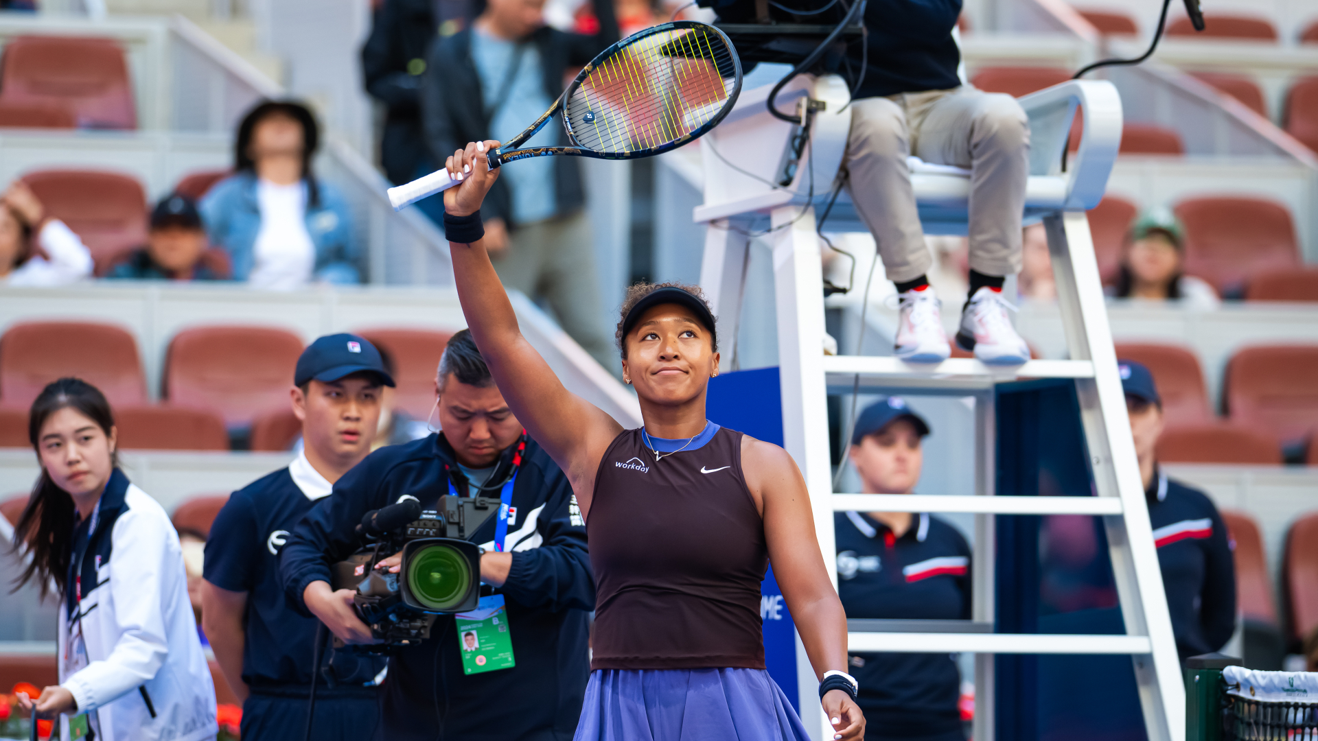 Osaka makes winning start under Williams' former coach in Beijing