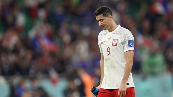 Robert Lewandowski leaves the field after Poland are knocked out of the 2022 World Cup by France