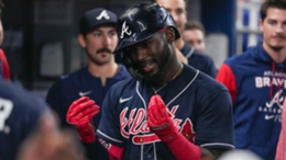 Atlanta Braves rookie Michael Harris II makes the money gesture with his hands after his home run on Sunday