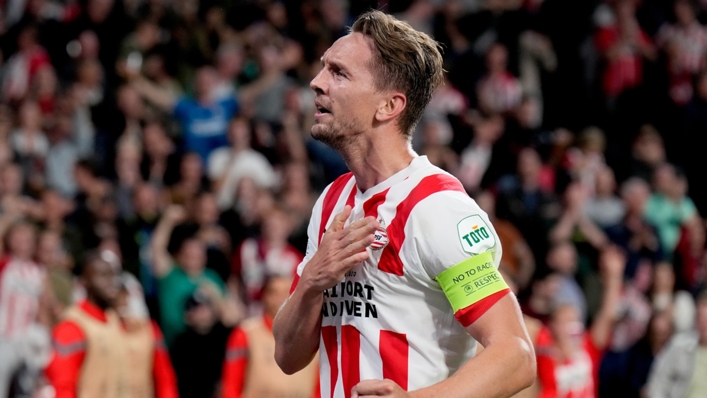 Luuk de Jong celebrates after doubling PSV's lead over Arsenal