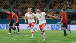 Robert Lewandowski celebrates equaling for Poland