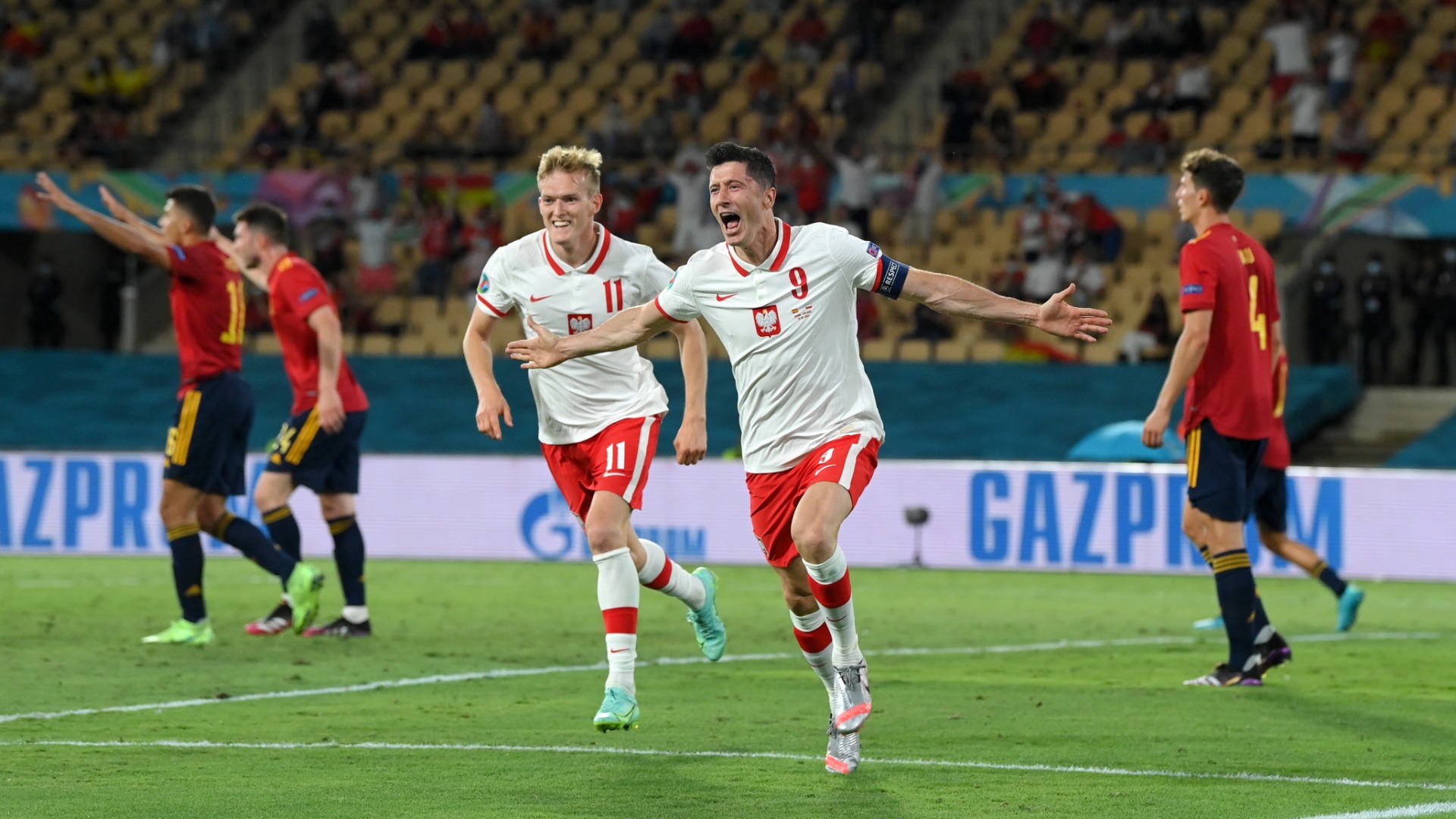 Robert Lewandowski celebrates equaling for Poland
