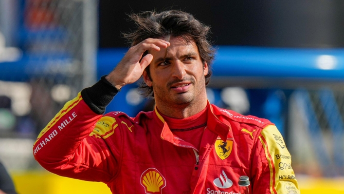 Ferrari driver Carlos Sainz of Spain celebrates his pole position after the qualifying session ahead of Sunday’s Formula One Italian Grand Prix auto race, at the Monza racetrack, in Monza, Italy, Saturday, Sept. 2, 2023. (AP Photo/Luca Bruno)