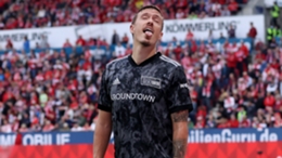 Max Kruse reacts to being showered in beer