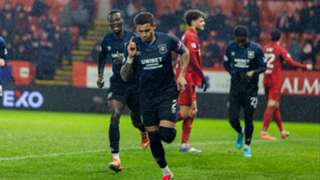 Rangers close gap after 10-man leaders Hearts hold off Dundee