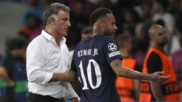Paris Saint-Germain's Cristophe Galtier gives instructions to Neymar during their win against Maccabi Haifa