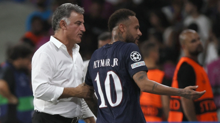 Paris Saint-Germain's Cristophe Galtier gives instructions to Neymar during their win against Maccabi Haifa