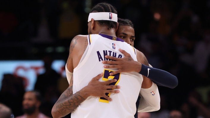 Carmelo Anthony hugs Ja Morant after the Lakers beat the Grizzlies