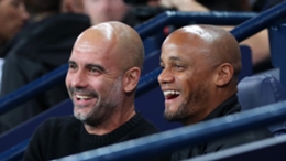 Pep Guardiola (l) and Vincent Kompany pictured in 2019