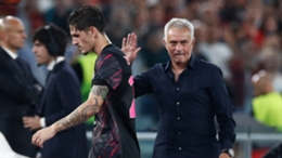 Jose Mourinho (L) greets Nicolo Zaniolo after withdrawing the attacker in Roma's win over HJK Helsinki