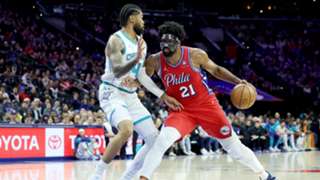Masked Embiid scores 34 in return to lift 76ers