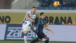 Edin Dzeko (left) could not find a way through as Inter were held to a 0-0 draw by Atalanta