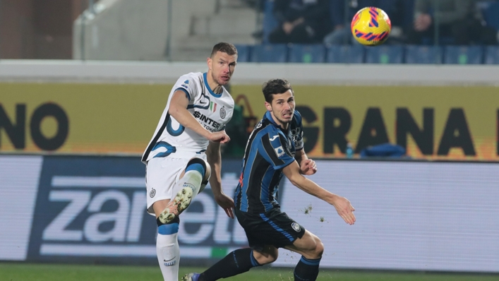 Edin Dzeko (left) could not find a way through as Inter were held to a 0-0 draw by Atalanta