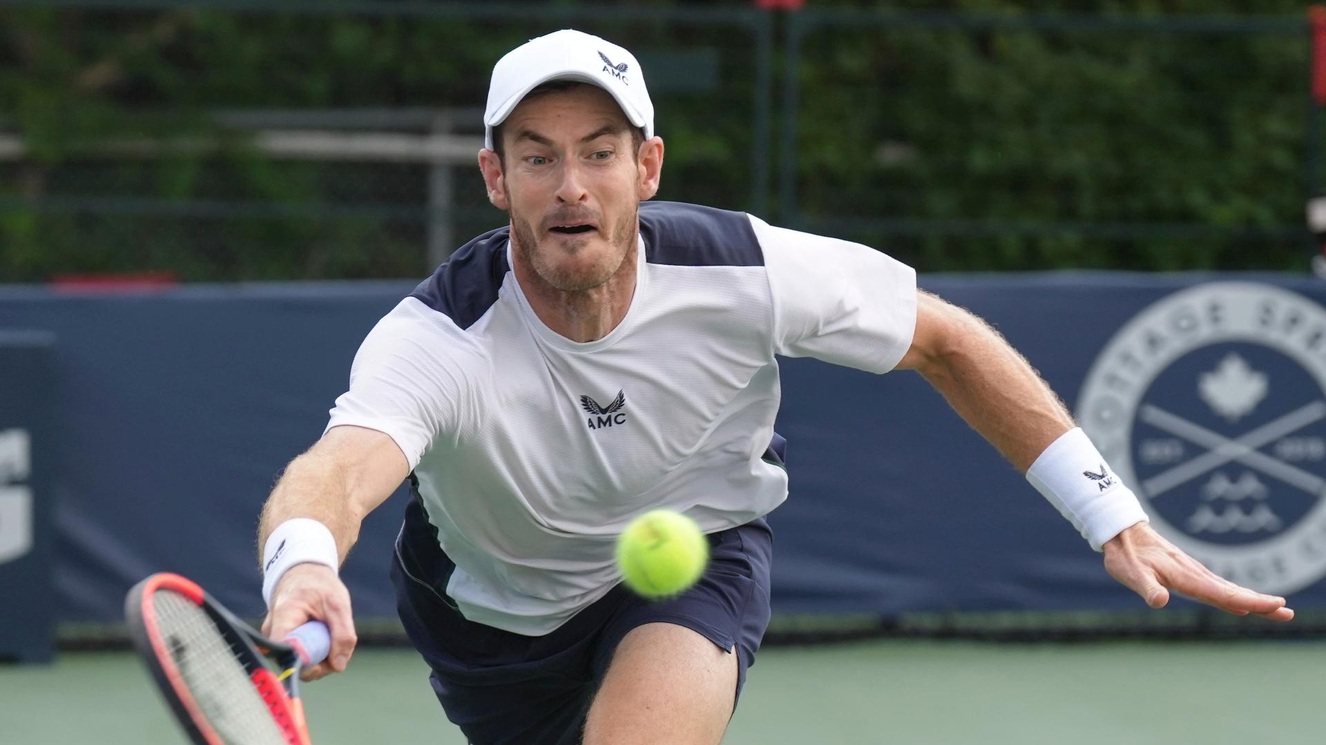 Britain's Andy Murray strains to reach a shot from Australia’s Max Purcell (Chris Young/The Canadian Press via AP)