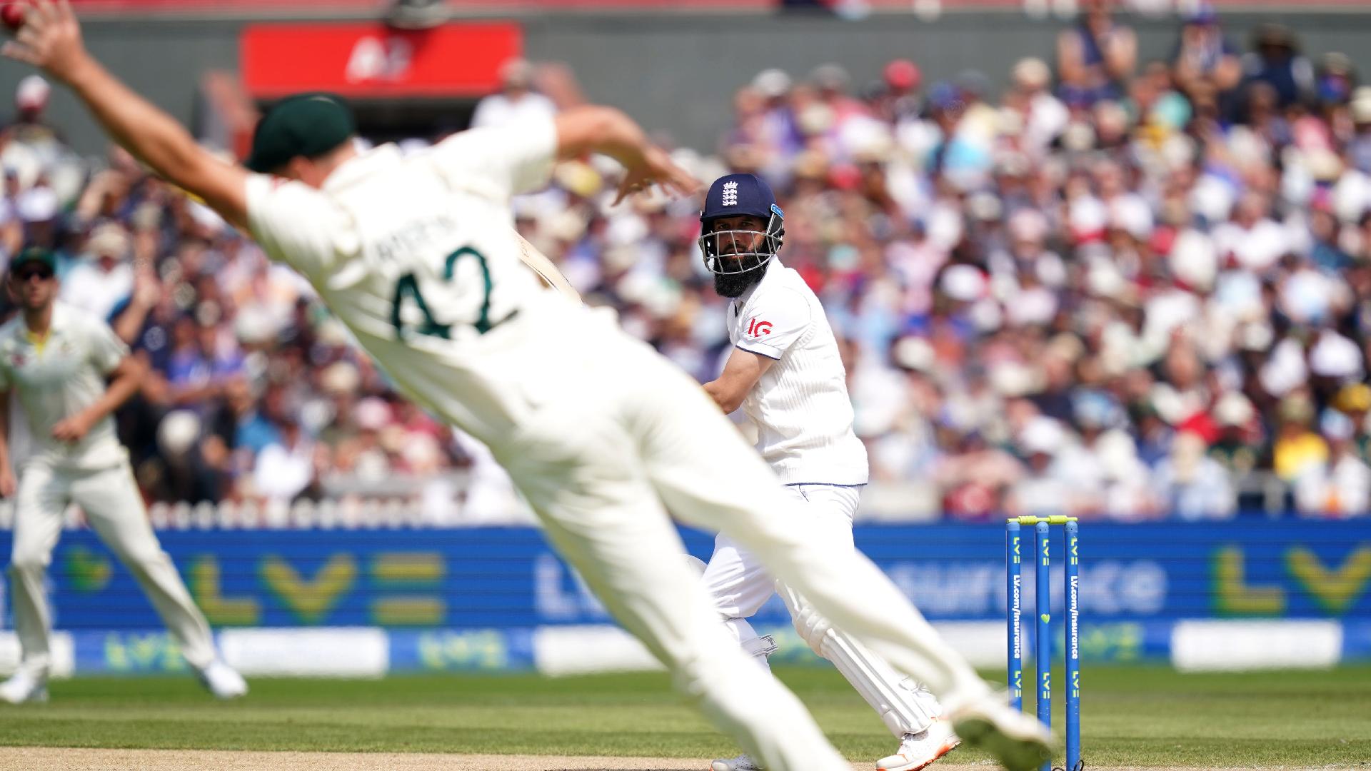 Moeen Ali, right, reaches 3,000 Test runs with a boundary against Australia (Martin Rickett/PA)
