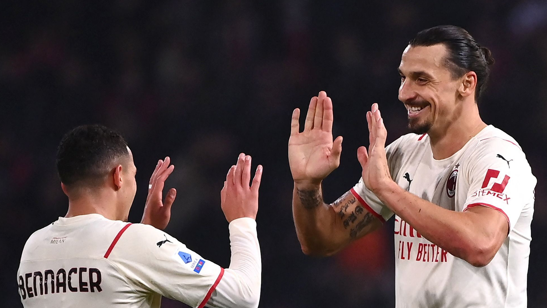 Ismael Bennacer and Zlatan Ibrahimovic celebrates as Milan win at Bologna