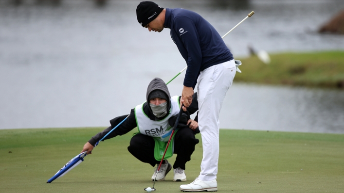 Beau Hossler lines up a putt on his way to an opening 64 at the RSM Classic