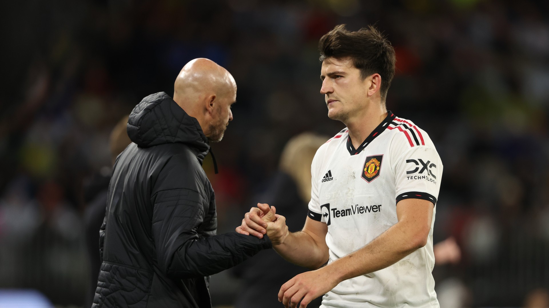 Erik ten Hag (L) has laid a challenge down for Harry Maguire (R)
