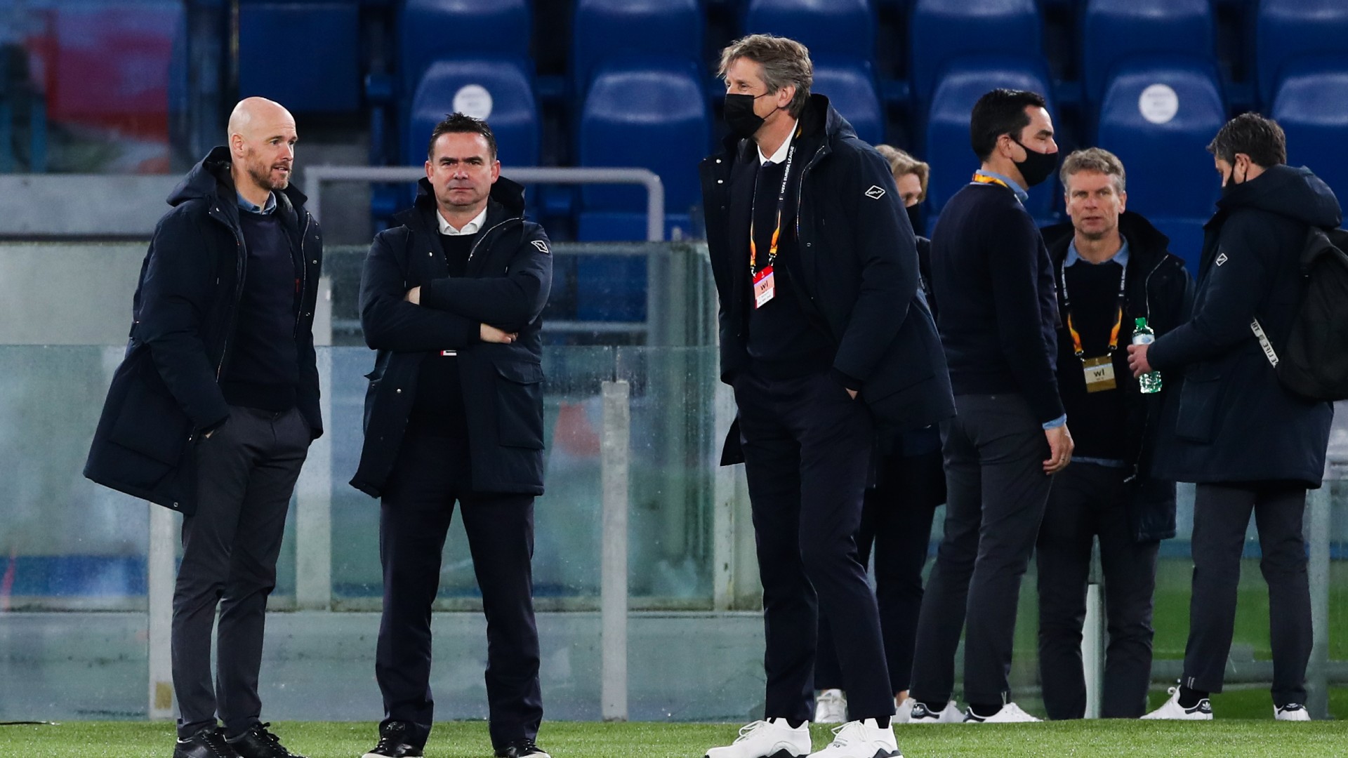 Erik ten Haag (left) expects Marc Overmars (second left) to stay at Ajax