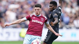 New clubmates Declan Rice (left) and Thomas Partey battle for the ball (PA)
