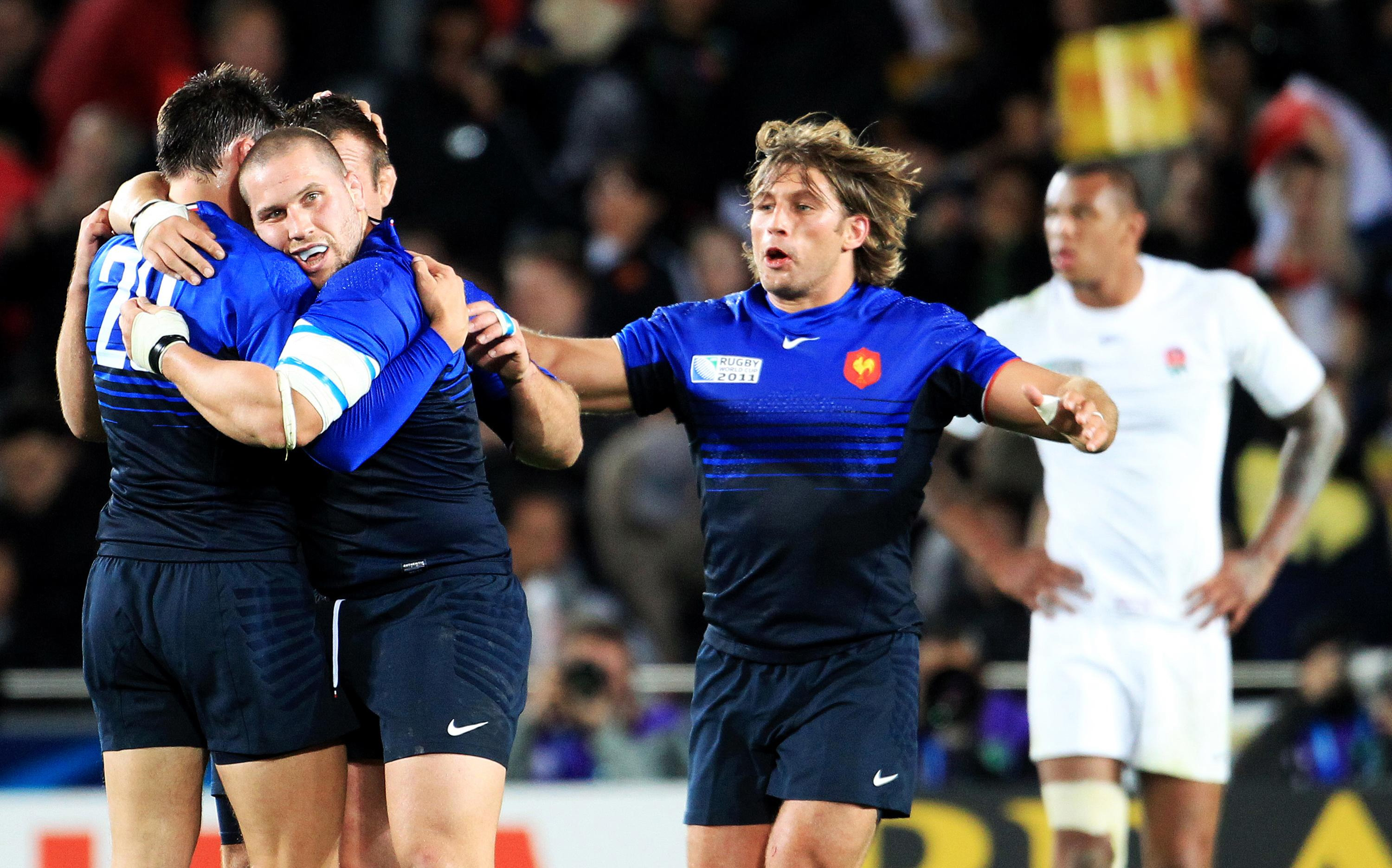 France’s Cedric Heymans, Fabien Barcella and Dimitri Szarzewski celebrate