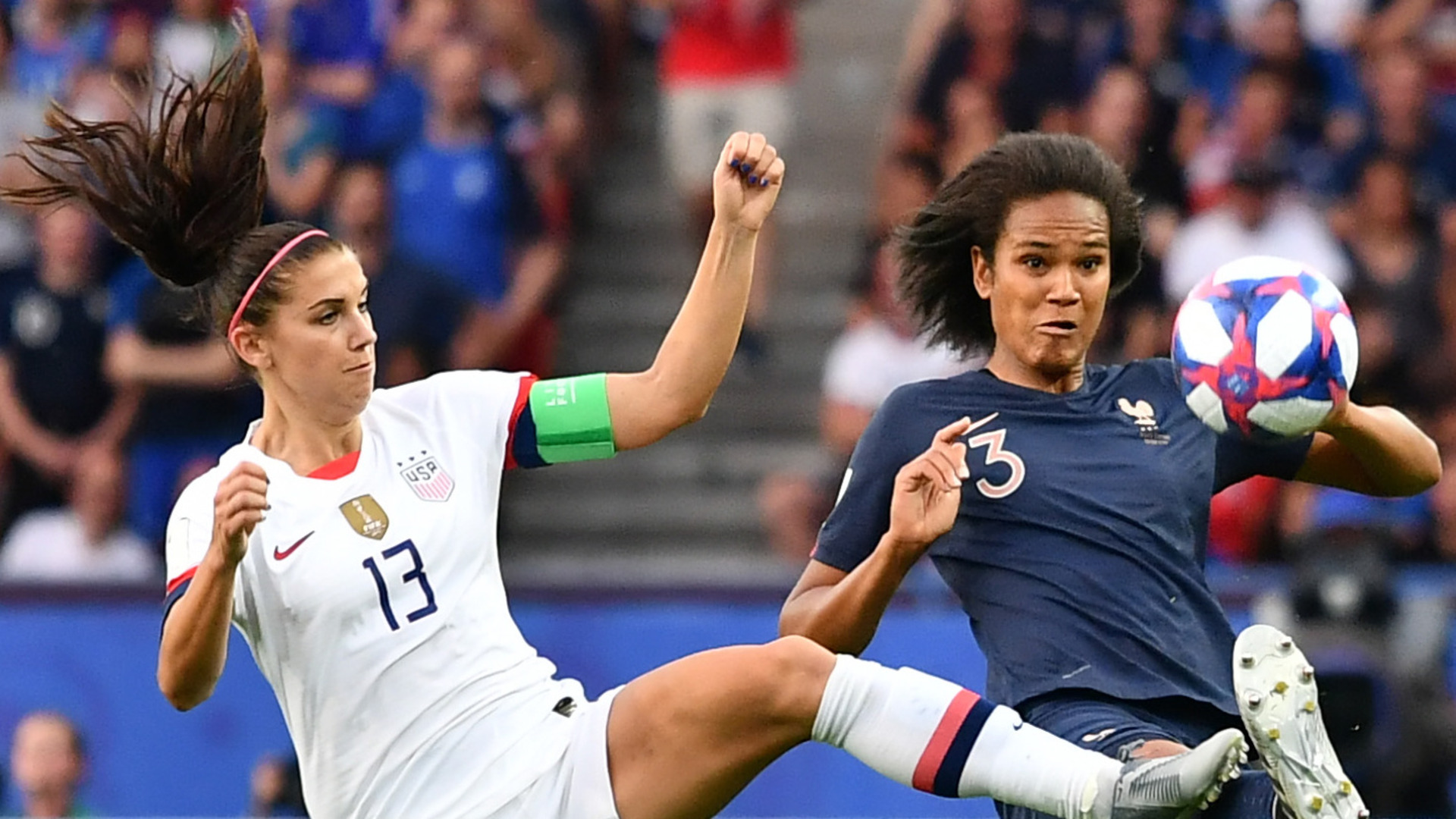 Alex Morgan (L) has thrown her support behind a player protest led by Wendie Renard (R)
