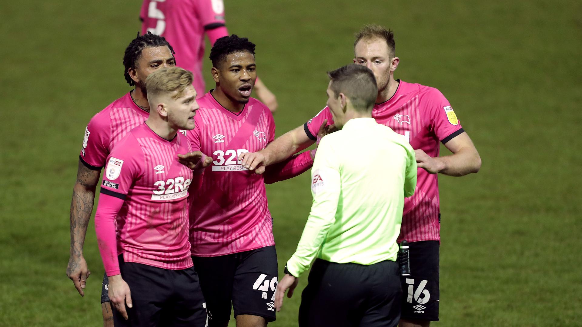 Referees have been instructed to issue at least one card where they are confronted by two or more players (Richard Sellers/PA)
