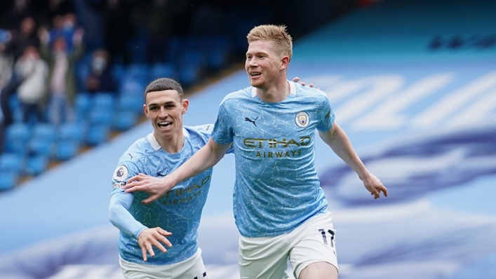 Kevin De Bruyne and Phil Foden in action for Man City