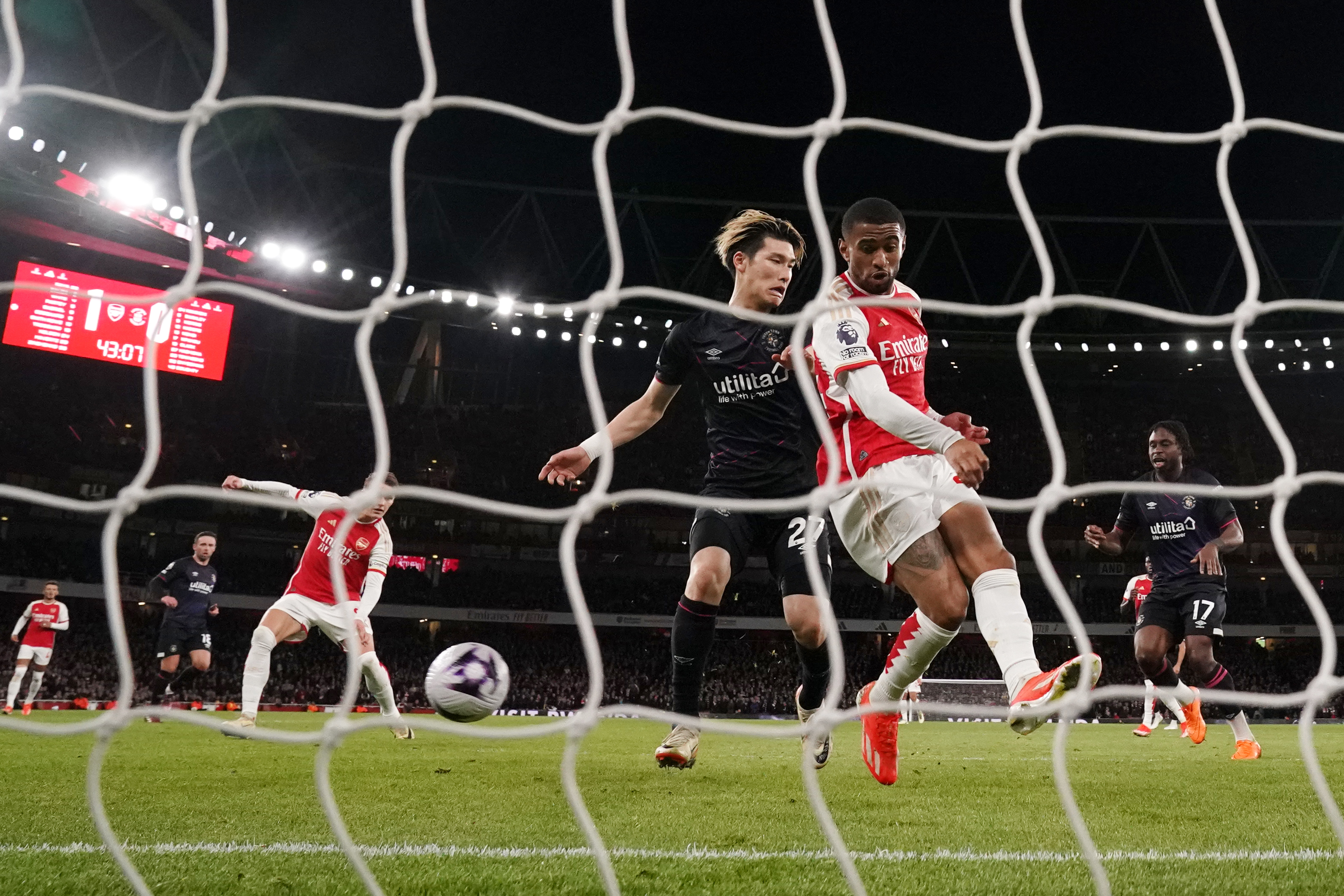 Daiki Hashioka diverts a cross into his own net