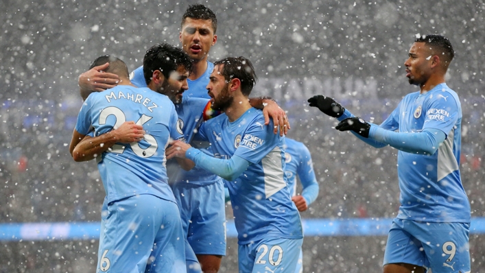 Manchester City players celebrate after opening the scoring against West Ham.