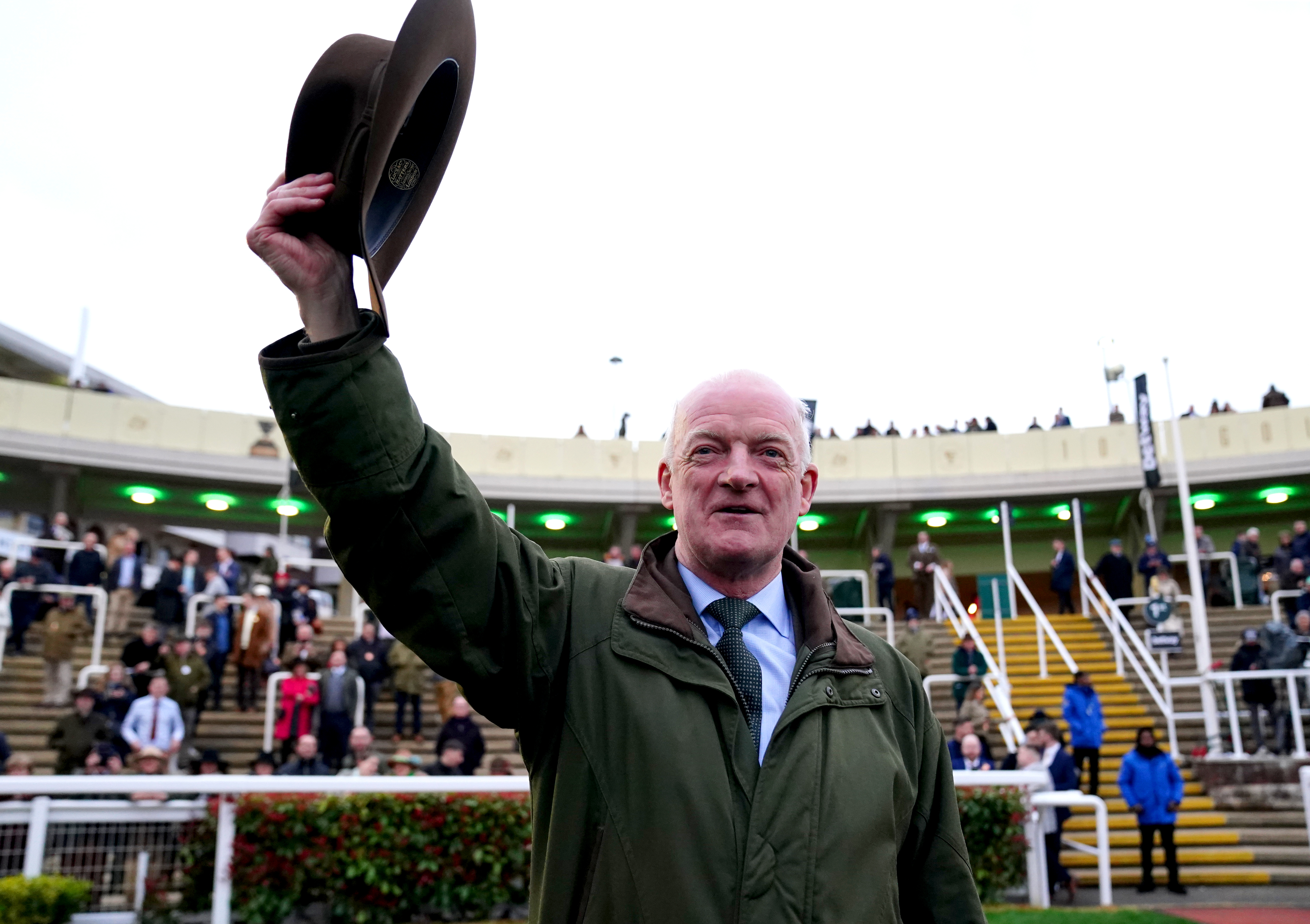 Willie Mullins salutes the Cheltenham crowd following his 100th win
