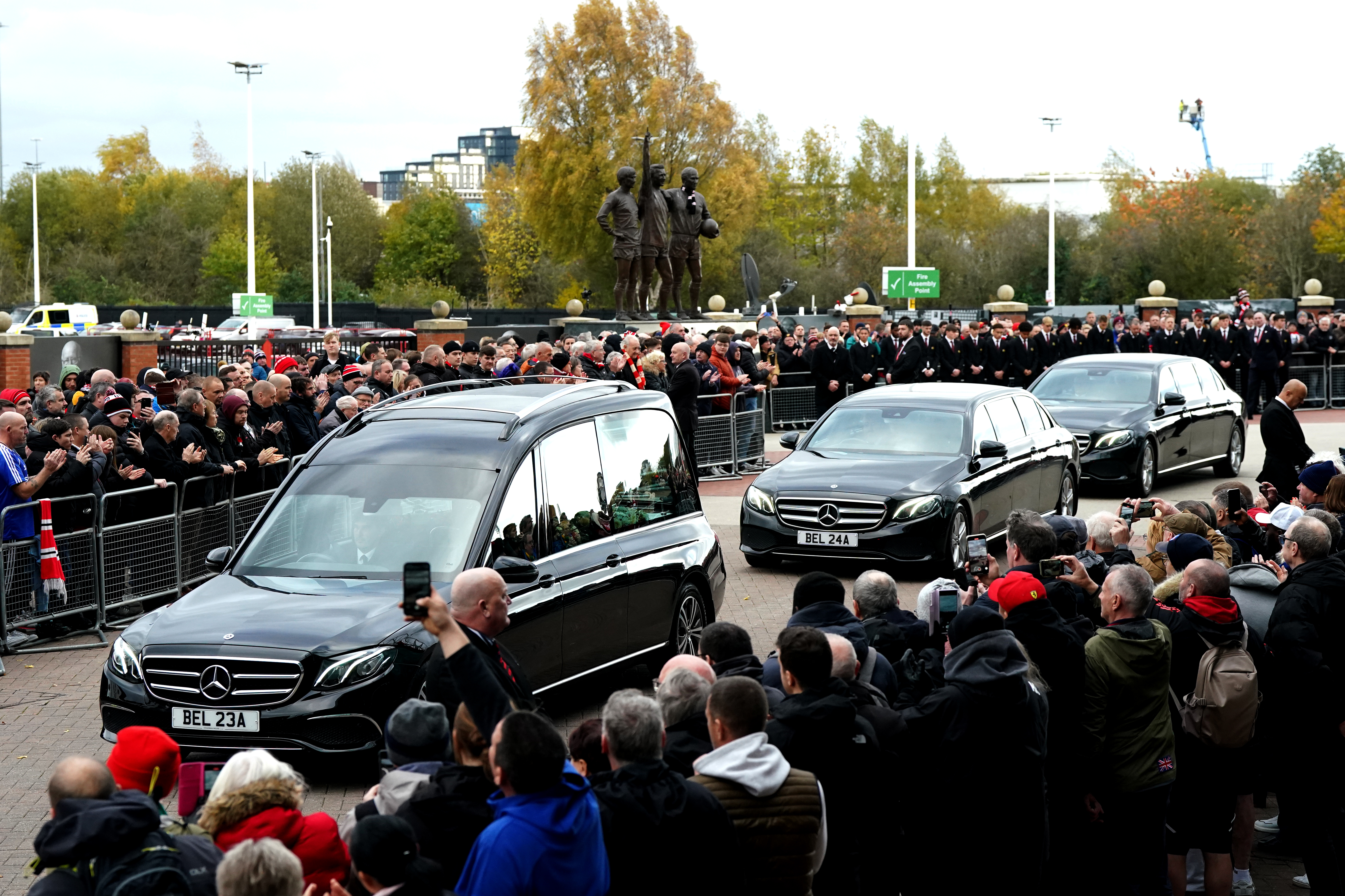 Sir Bobby Charlton's funeral cortege passes Old Trafford