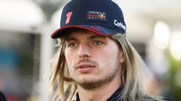 Blond ambition! Max Verstappen pulls on a wig in the Australian Grand Prix paddock